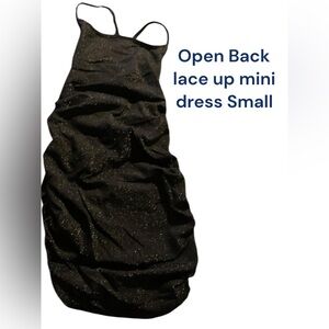 Black small bodycon mini dress with shimmery silver specs open lace up back